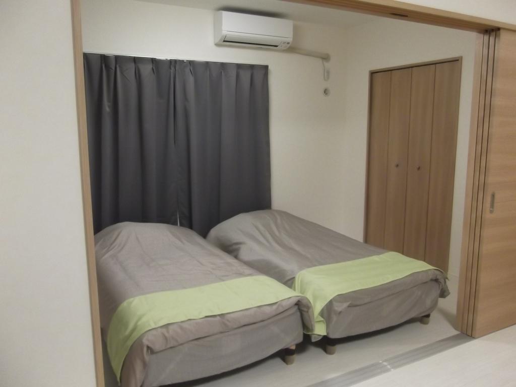 Apartamento Rainbow Terrace Ginowan Exterior foto