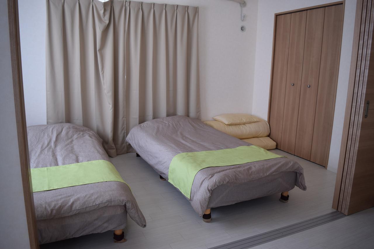 Apartamento Rainbow Terrace Ginowan Exterior foto